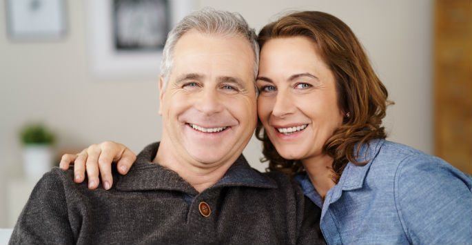 Man and woman smiling