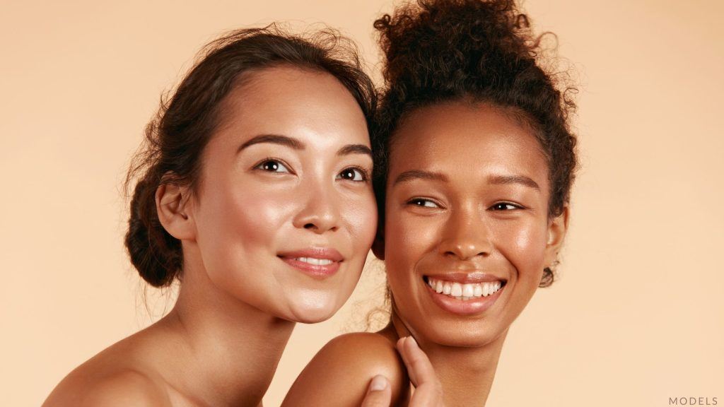 Two woman with glowing skin (models)